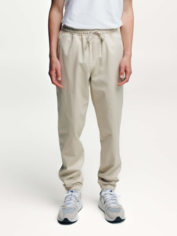 Anorakkihousut, rantahiekka